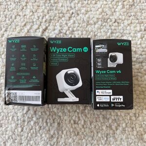 4 wyze cam v4 bundle, 3 Brand new and 1 used indoor